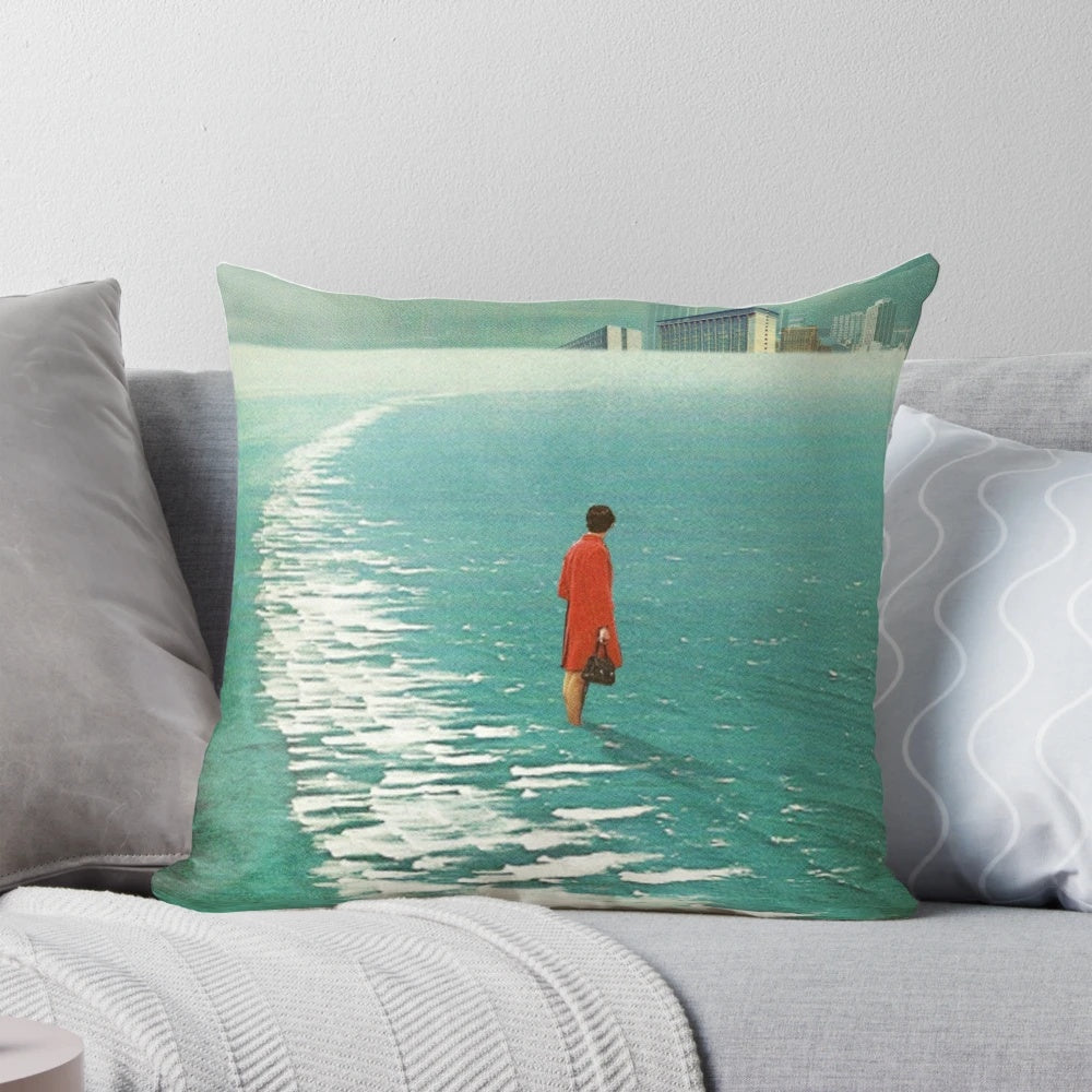Vintage collage style pillow with a futuristic city landscape fading into the sea