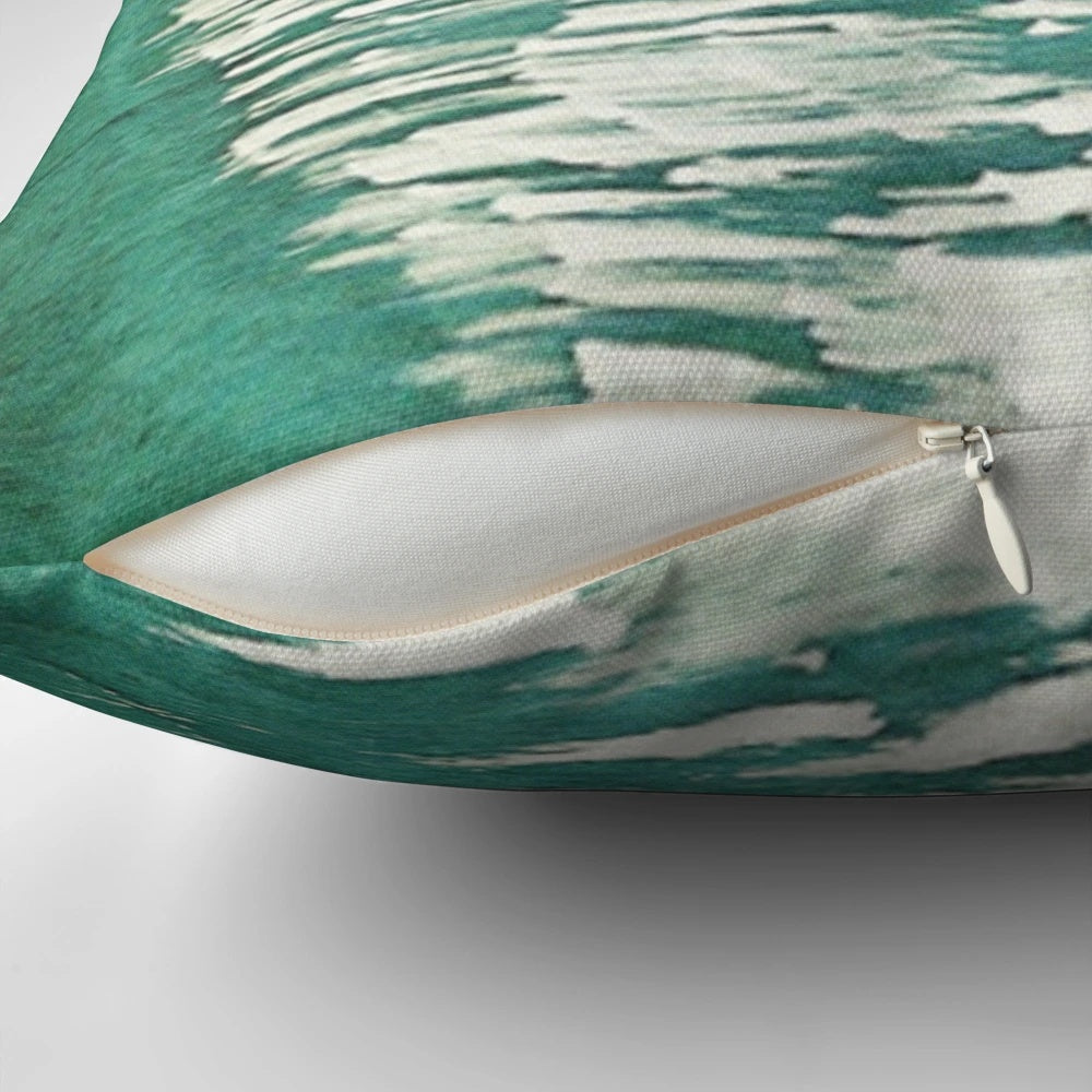 Vintage collage style pillow with a futuristic city landscape fading into the sea