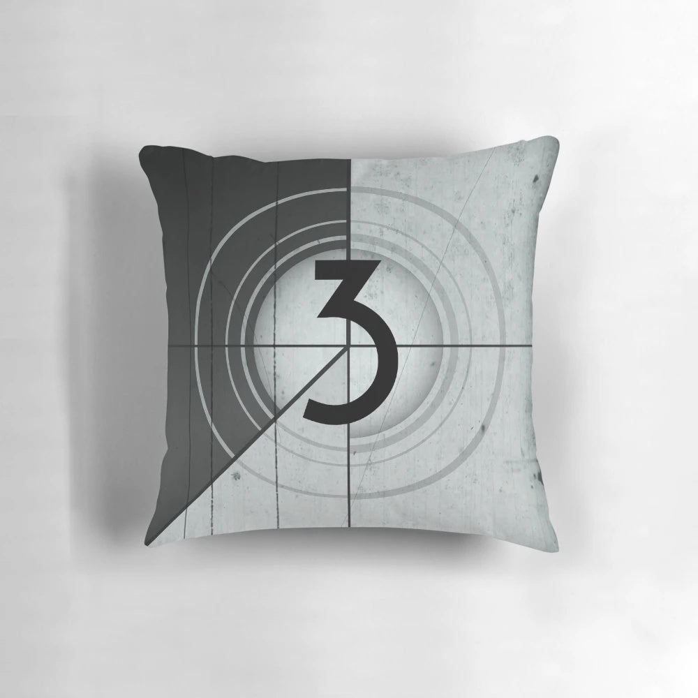 Vintage-style countdown pillow with a classic cinema or theater aesthetic