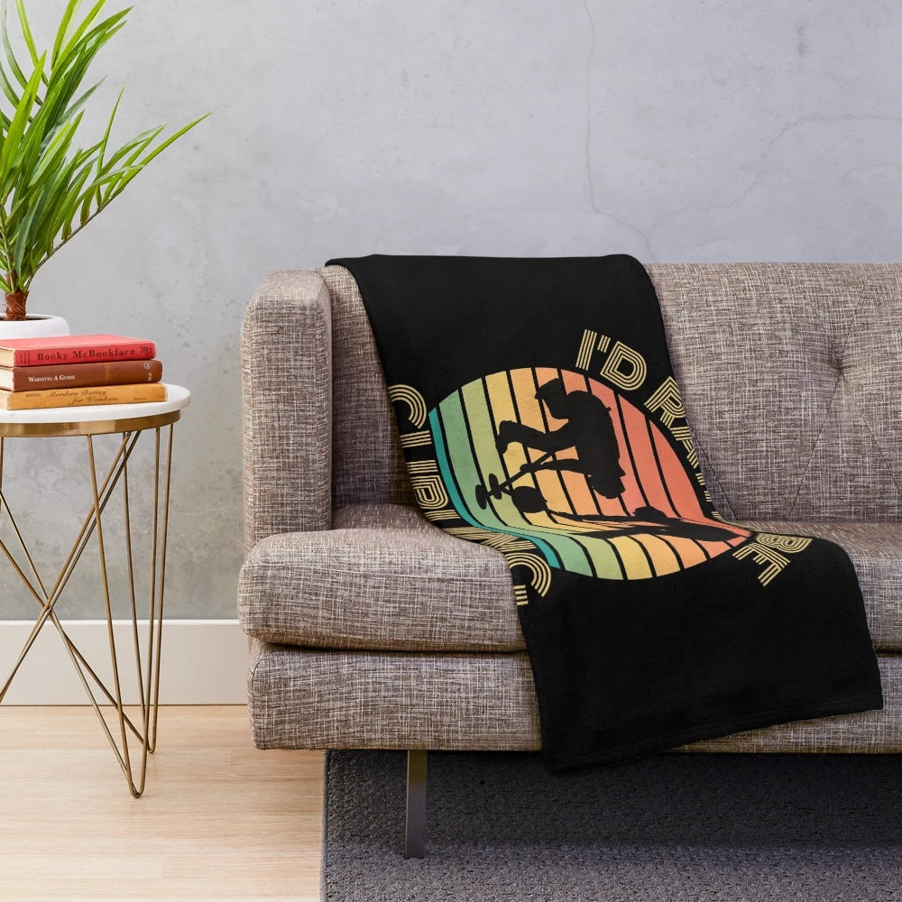 Vintage curling art plush blanket featuring a sunset design
