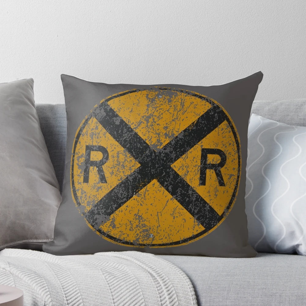 A vintage, distressed railroad crossing sign with a cool, weathered appearance, perfect for adding industrial charm to your home.