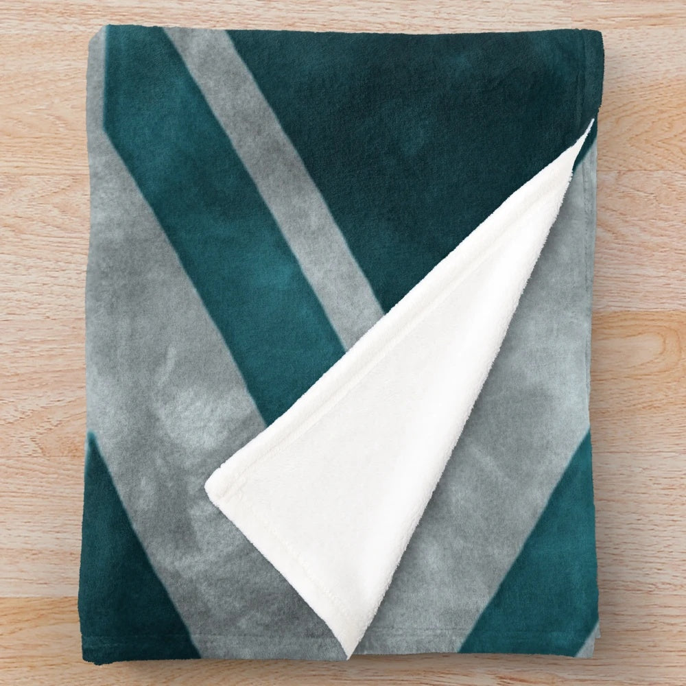 Teal plush blanket with distressed union jack design