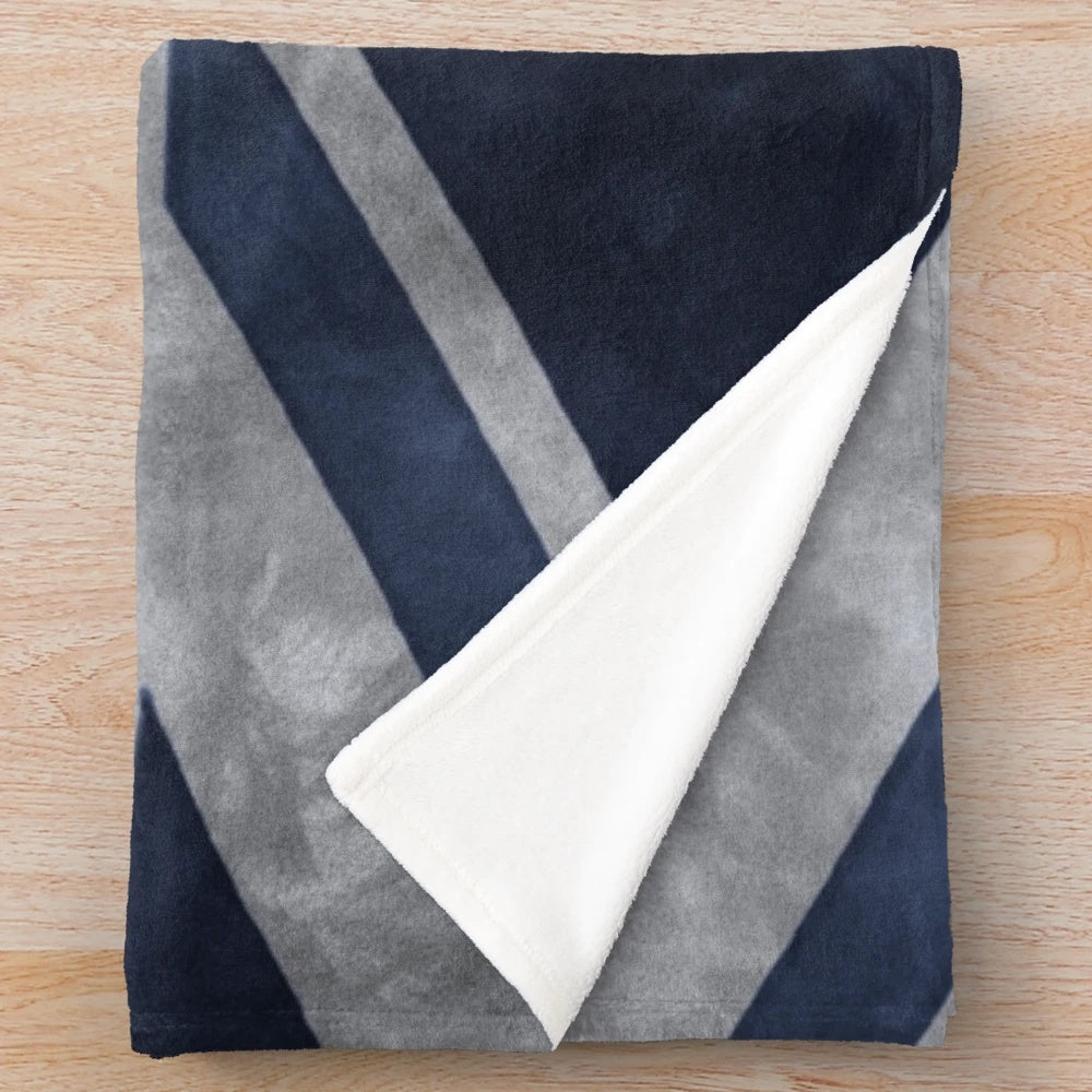 Blue and white distressed Union Jack design plush blanket