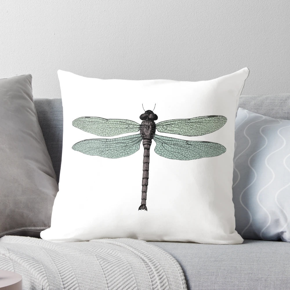 Vintage-inspired dragonfly typographic design on a throw pillow