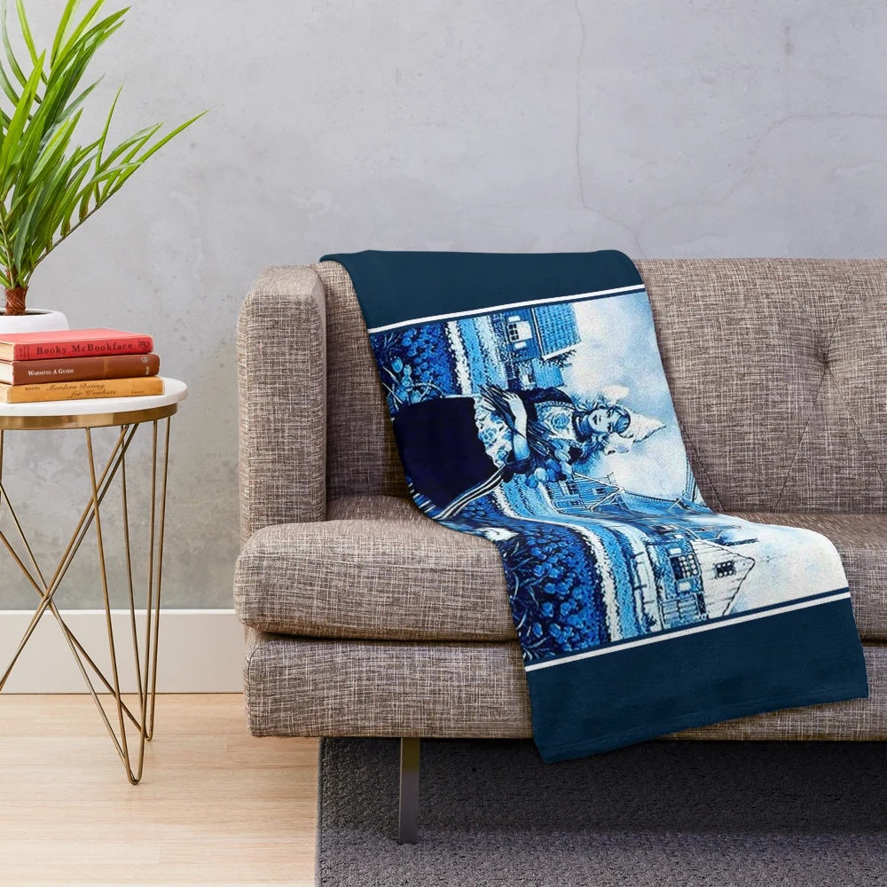 Vintage Dutch Blue Delft plush blanket with print of windmill, young girl, dog, and tulips