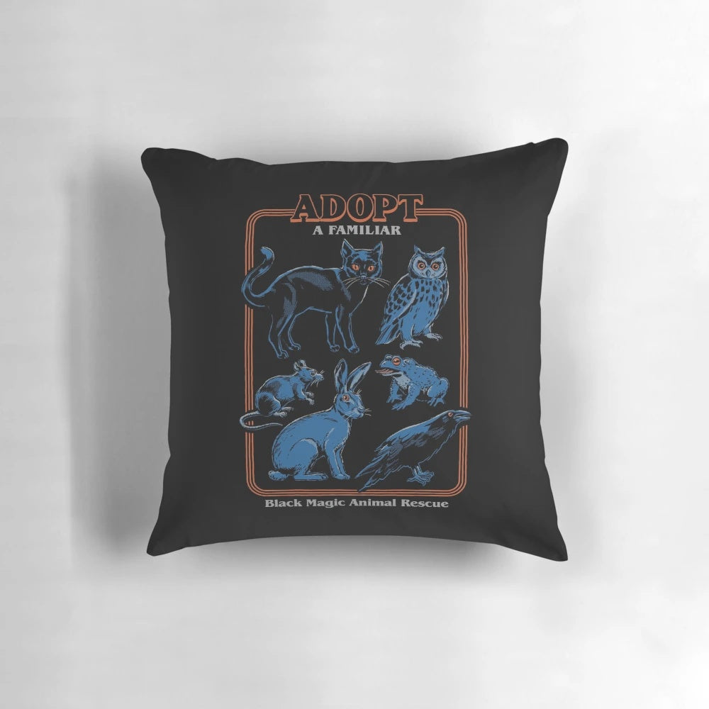 Vintage-inspired familiar pillow featuring a whimsical design with a black cat, owl, and other mystical elements.