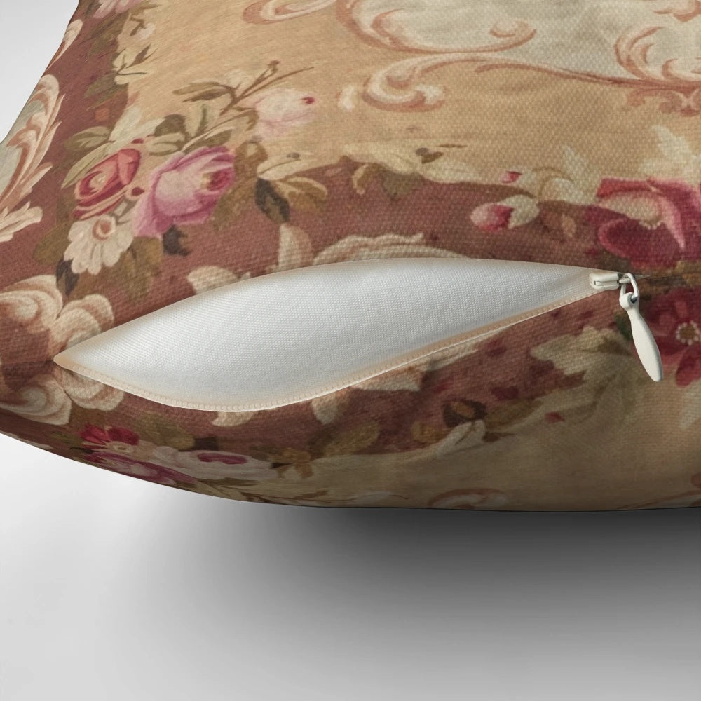Vintage-inspired floral print pillow with an Aubusson-style design, featuring roses, daisies, and leaves in shades of brown and beige.