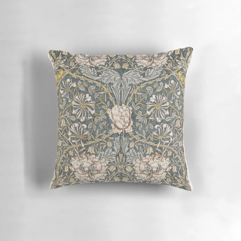 A vintage-inspired floral and botanical decorative pillow featuring the Pimpernel motif by William Morris.