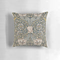 A vintage-inspired floral and botanical decorative pillow featuring the Pimpernel motif by William Morris.