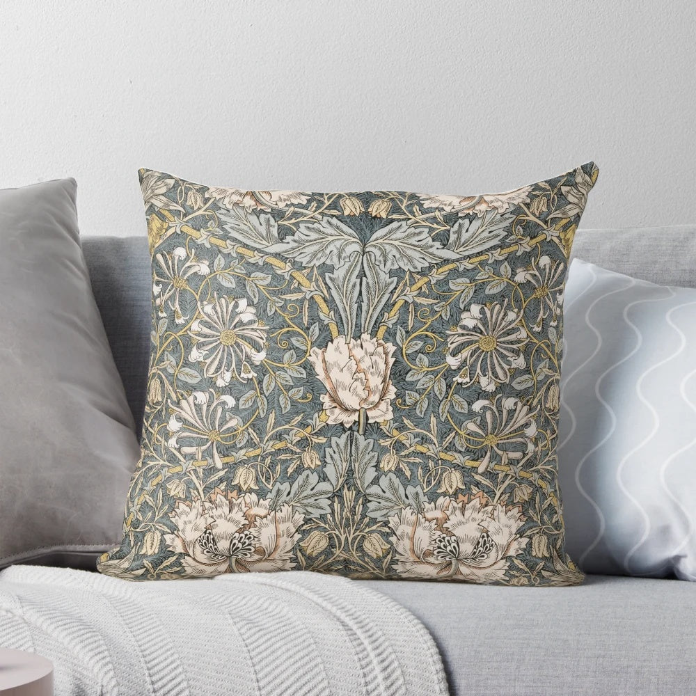 A vintage-inspired floral and botanical decorative pillow featuring the Pimpernel motif by William Morris.