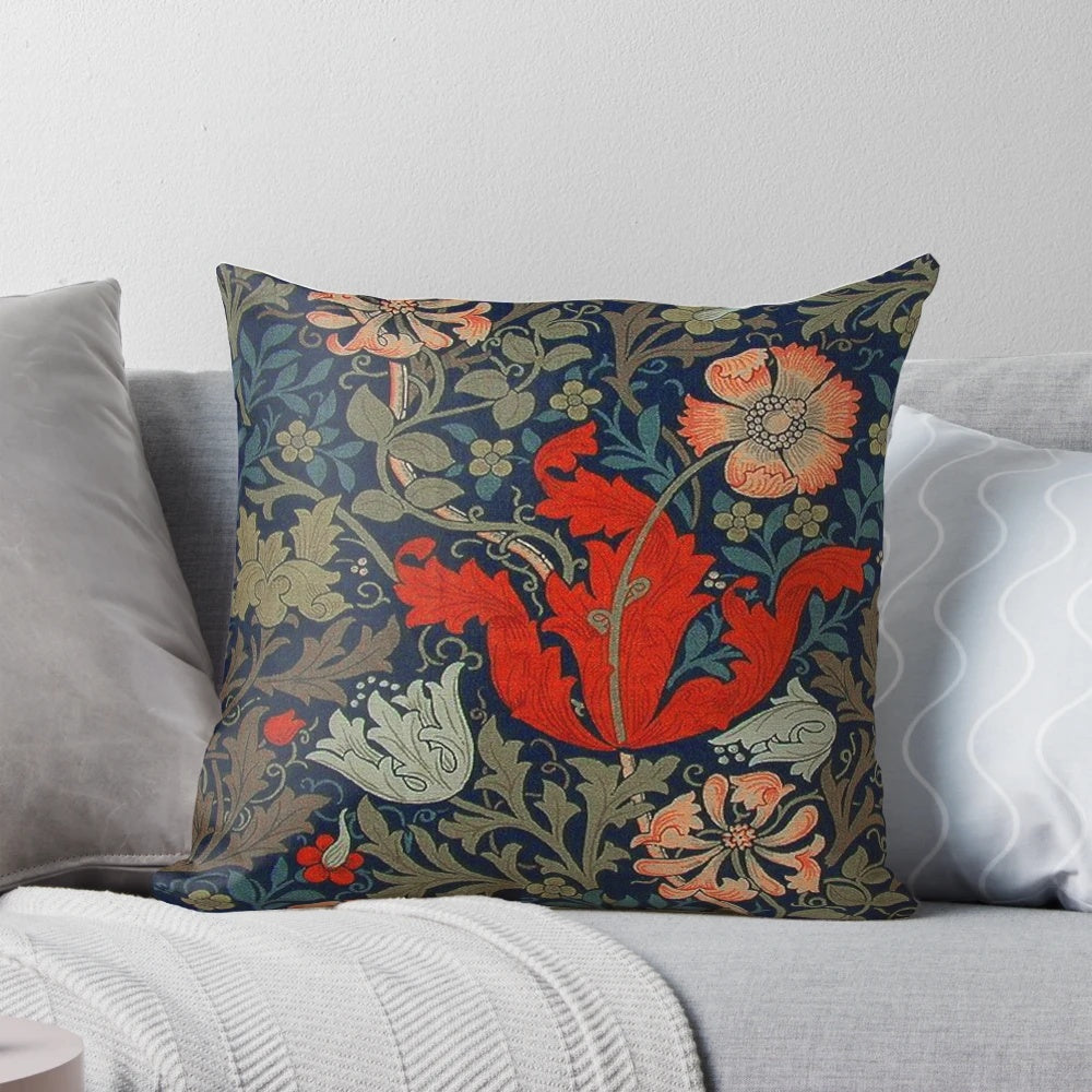 Vintage-inspired Compton pillow with lush floral pattern in shades of green and red