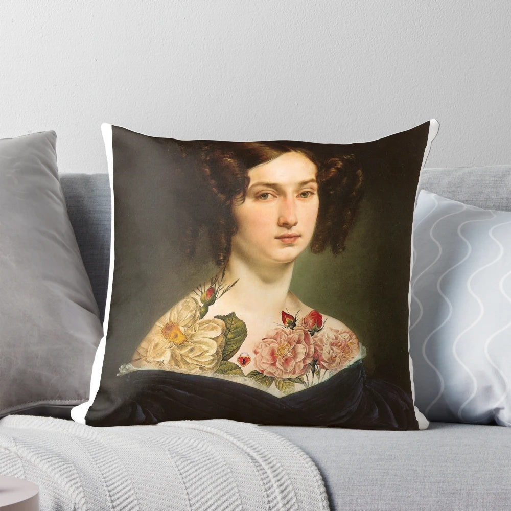 A vintage-inspired pillow featuring a collage of hearts, roses, and other floral elements in a surreal, artsy design.
