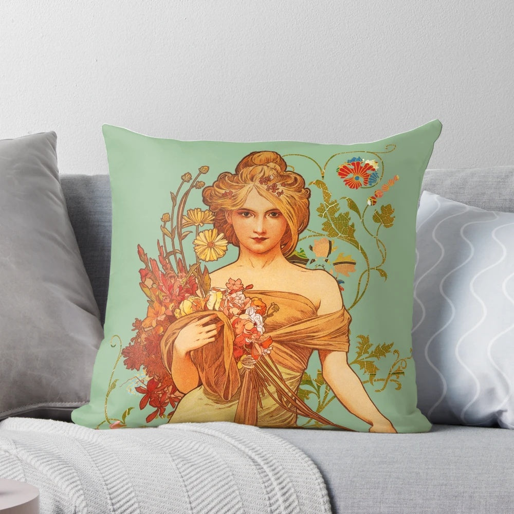 Vintage floral throw pillow featuring Alphonse Mucha's iconic art nouveau design with a woman and flowers.