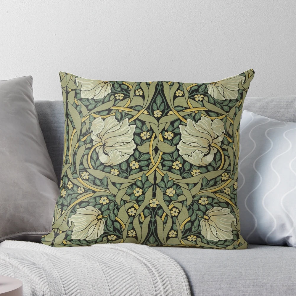 Vintage-inspired floral pillow in green and neutral tones, featuring a William Morris pattern design.