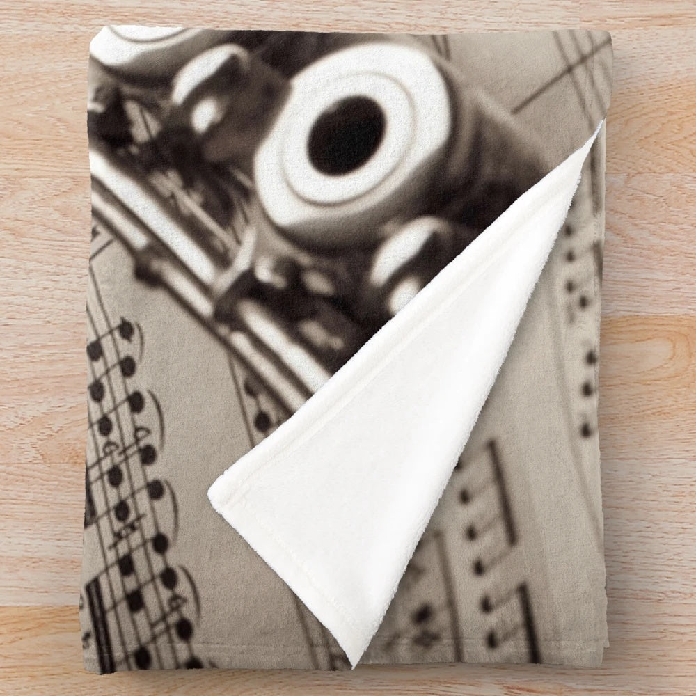 Vintage flute plush blanket with retro musical instrument design