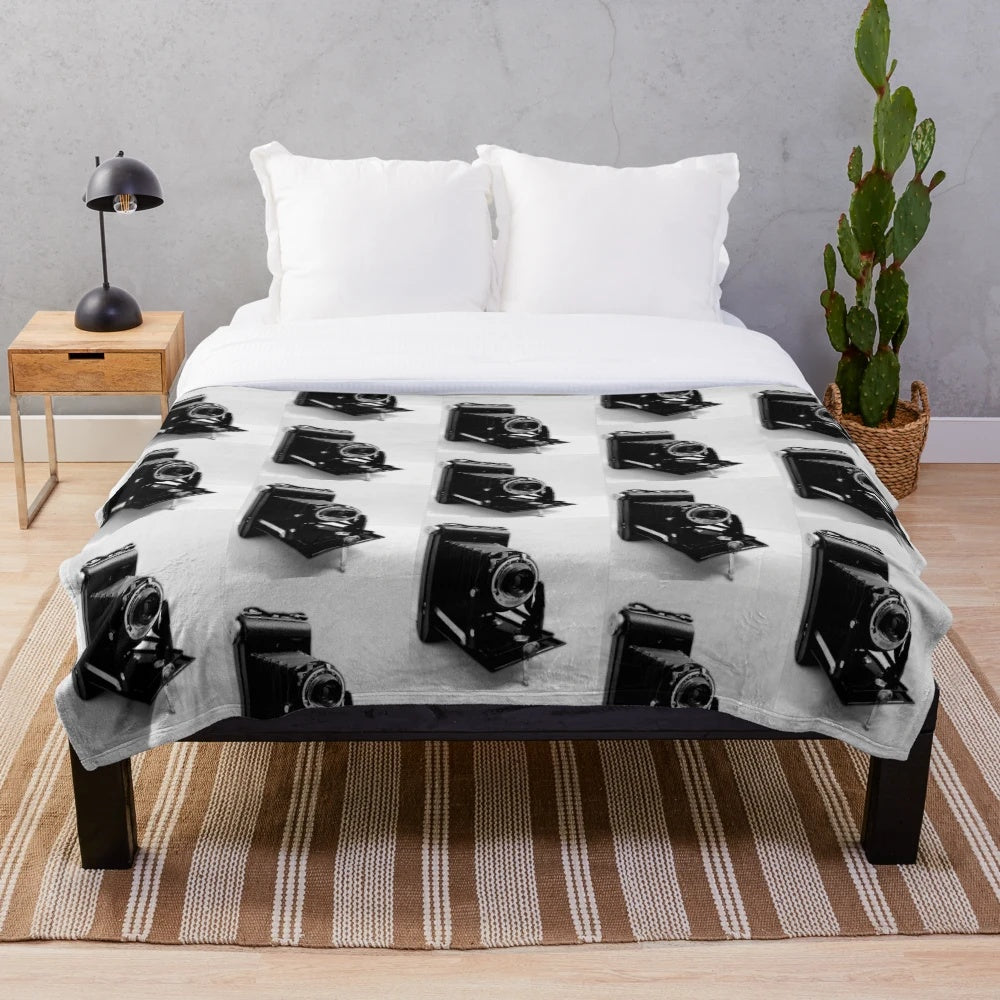 Vintage-style folding camera plush blanket for home decor and cozy comfort
