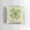 Vintage four-leaf clover pillow with a green shamrock design