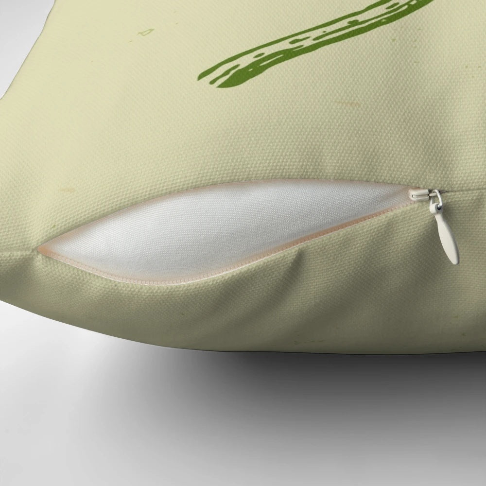 Vintage four-leaf clover pillow with a green shamrock design