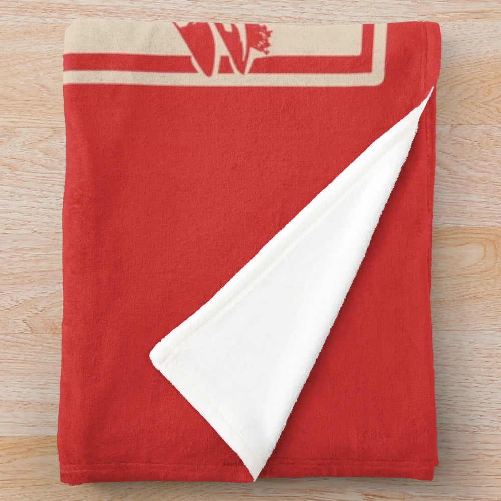 Vintage geometric ski poster design on a plush blanket for alpine skiers