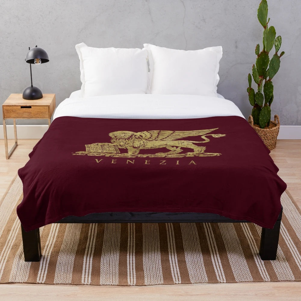 Vintage gold plush blanket with winged lion of Venice design