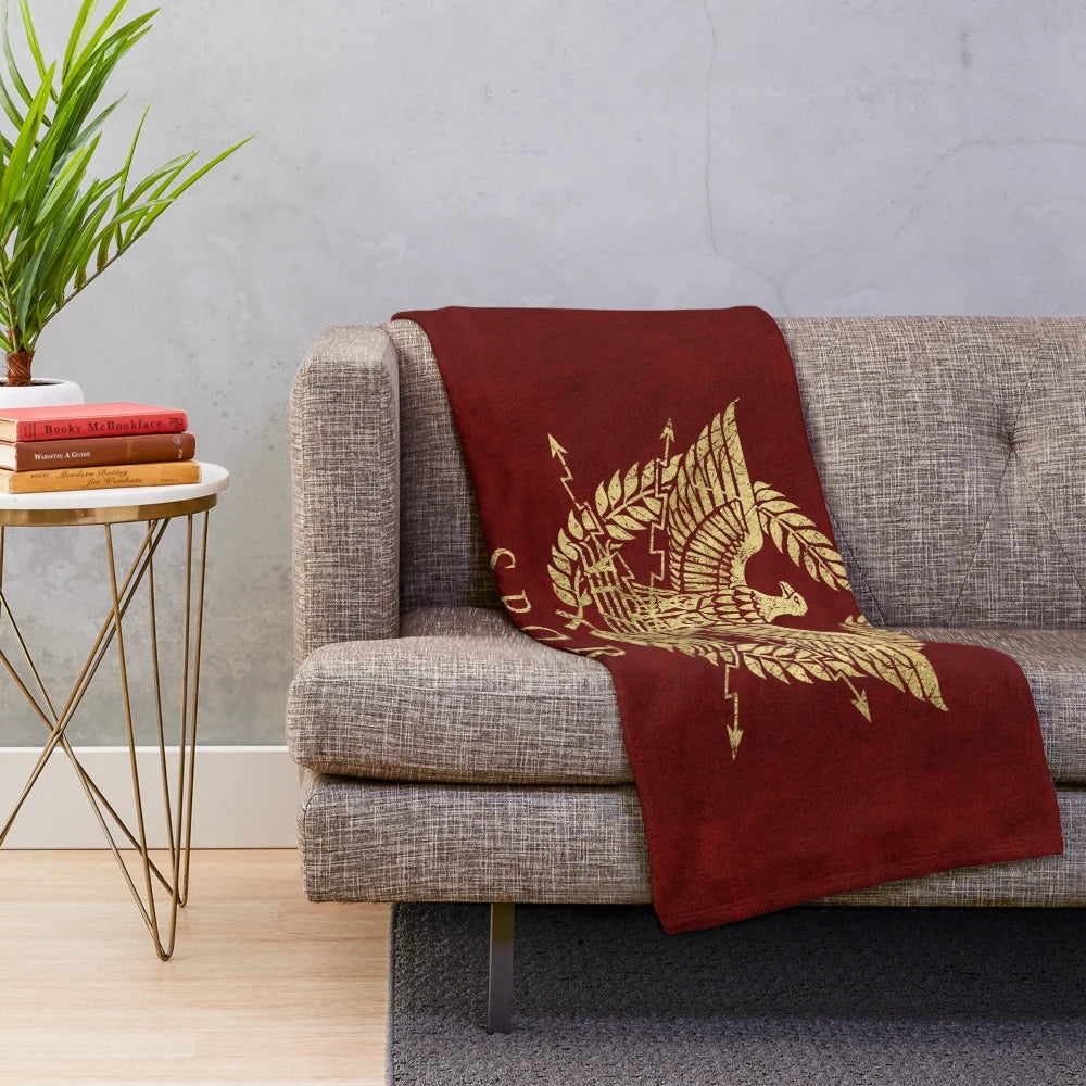 Vintage gold plush blanket featuring the iconic Roman Empire emblem