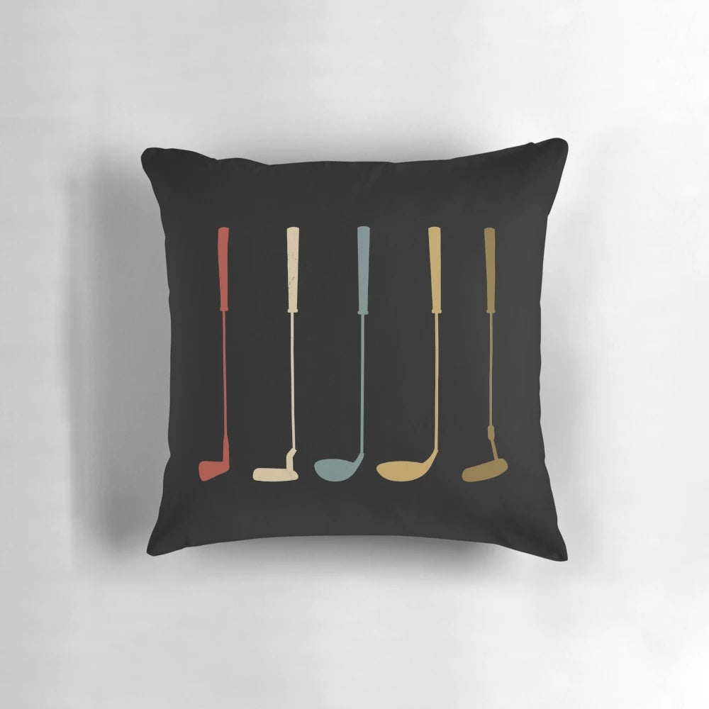 A plush pillow featuring a vintage and retro design of golf clubs, perfect for golf enthusiasts.