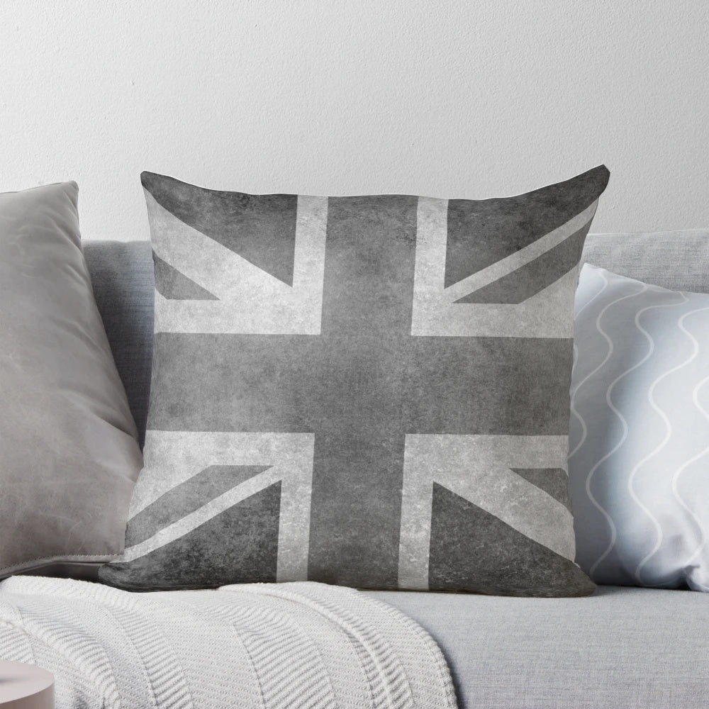 Vintage-style grayscale Union Jack pillow with a distressed, aged appearance