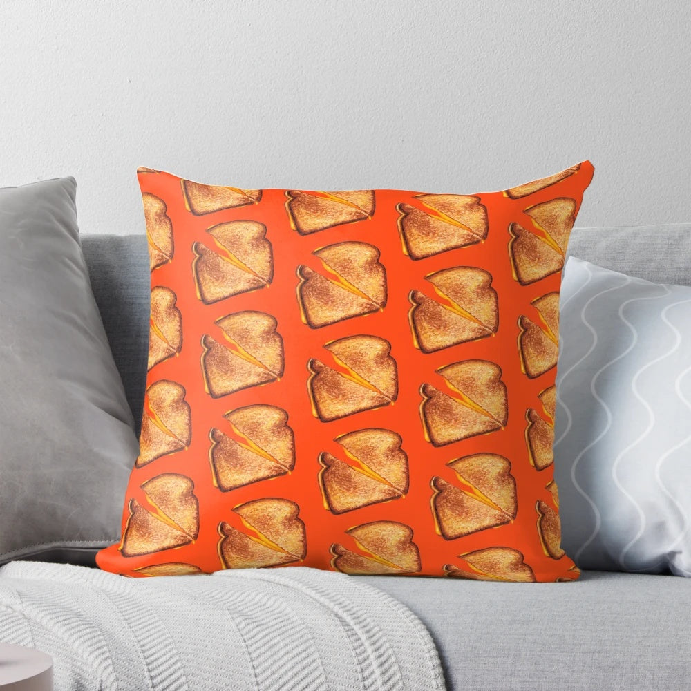 A red throw pillow featuring a vintage-inspired grilled cheese sandwich pattern design.