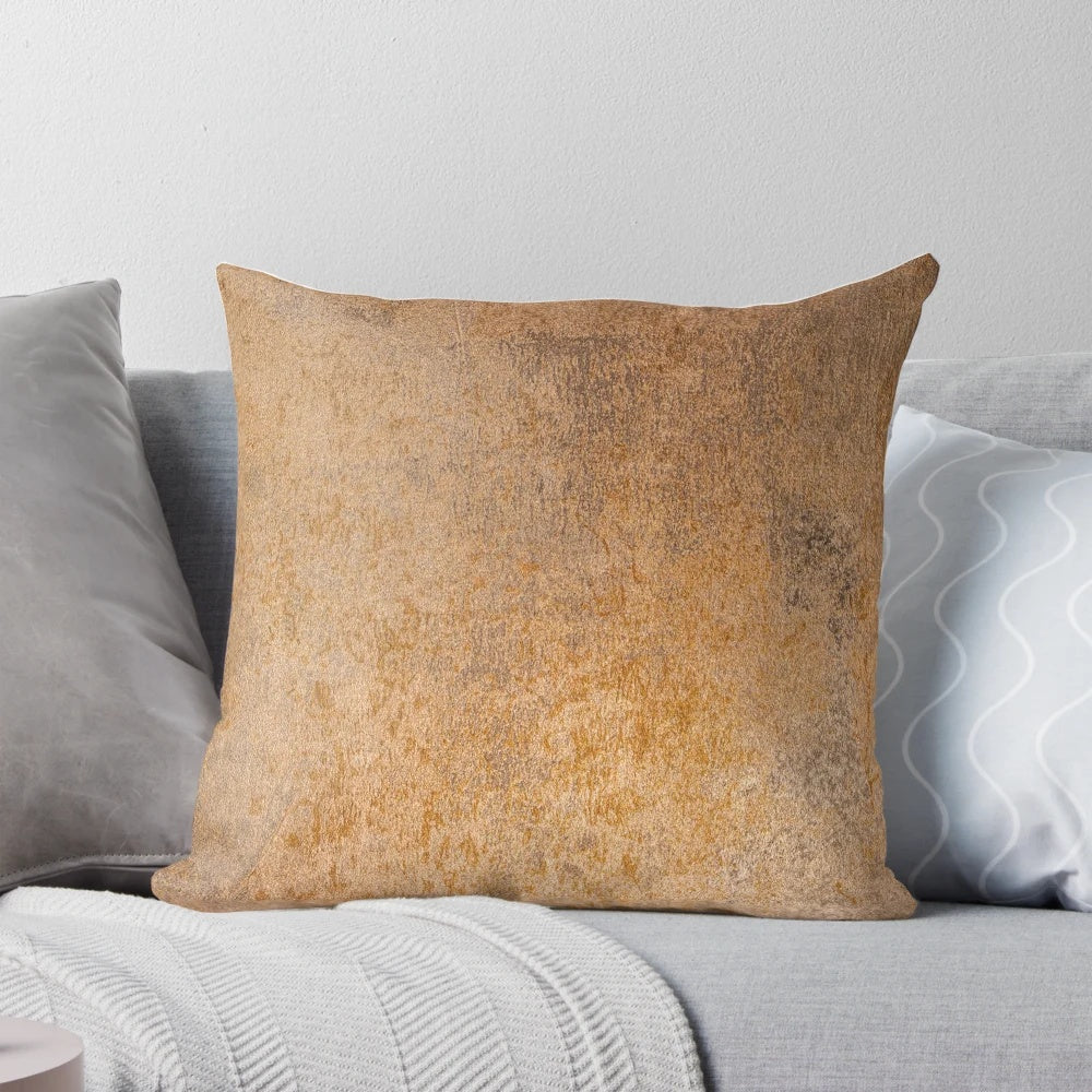 A pillow with a grunge, weathered metal texture in shades of gray and silver.
