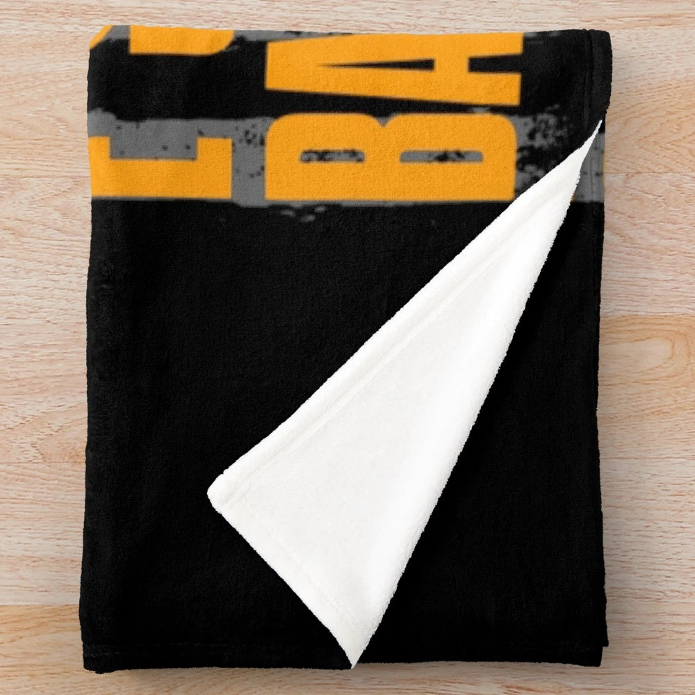 Vintage heavy metal rock music plush blanket featuring Bruce Springsteen's "The Boss" album art and tour imagery