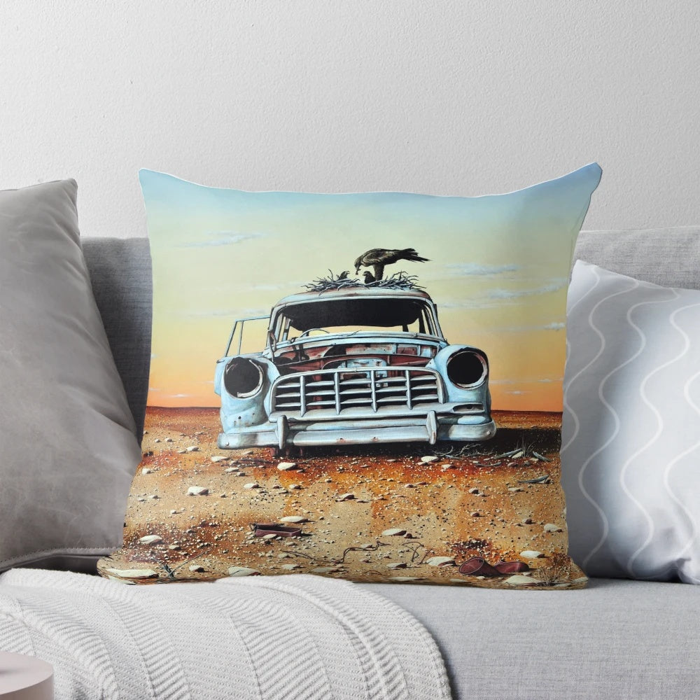 Vibrant pillow featuring a colorful, whimsical painting of an old Holden car in the Australian outback