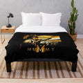Vintage-style plush blanket with mummy design