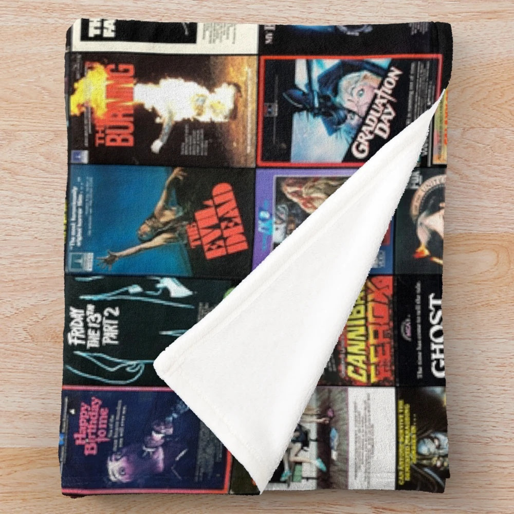 Retro horror movie inspired plush blanket with 1980s VHS artwork
