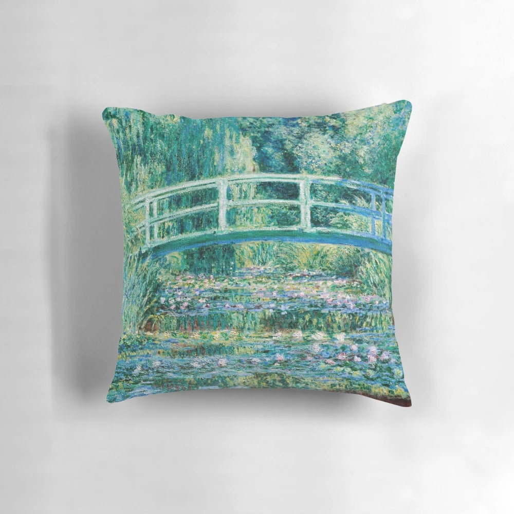 Vintage decorative pillow featuring Claude Monet's famous painting "Water Lilies and Japanese Bridge