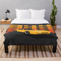 Illustration of a 1986 Porsche 944 in yellow on a plush blanket