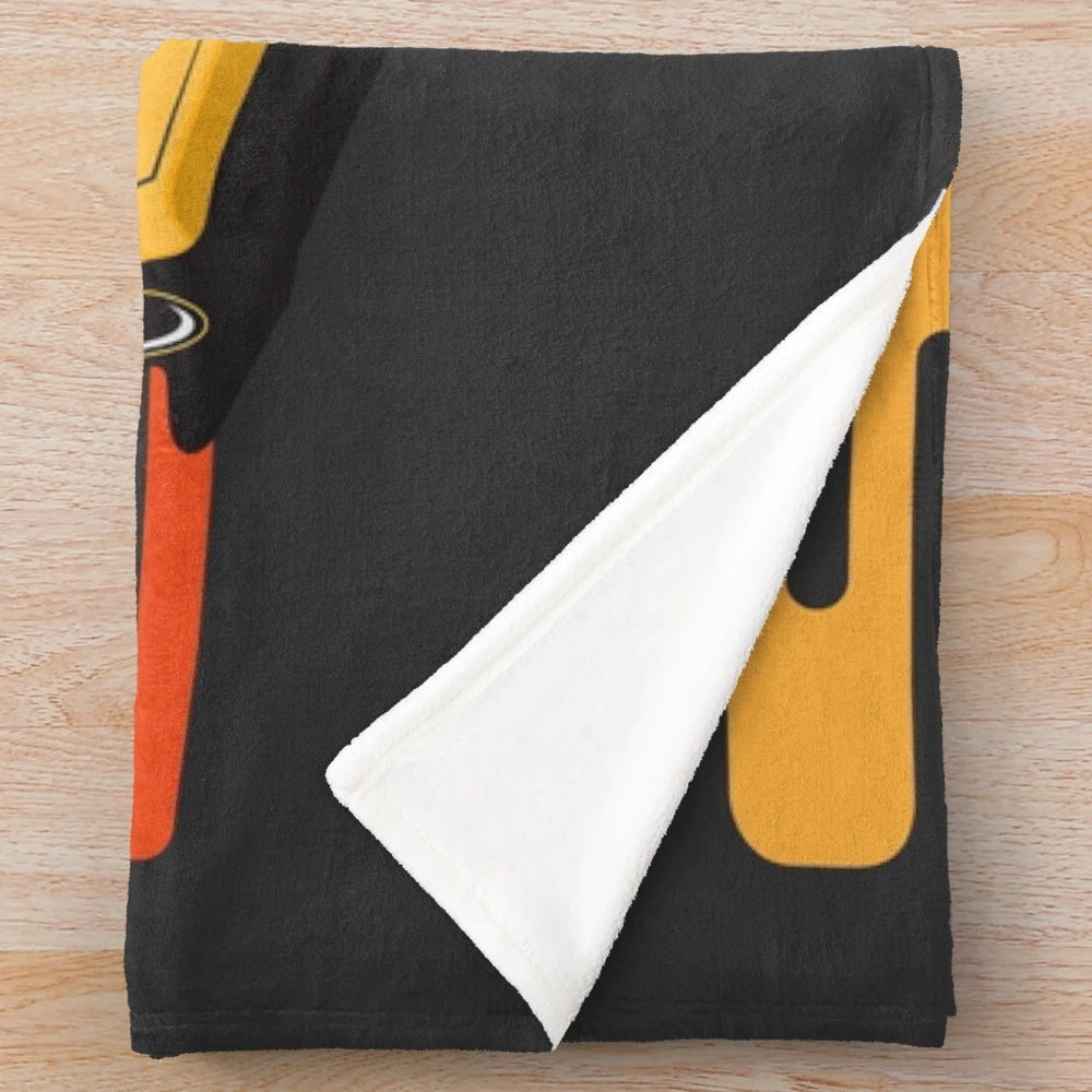 Illustration of a 1986 Porsche 944 in yellow on a plush blanket