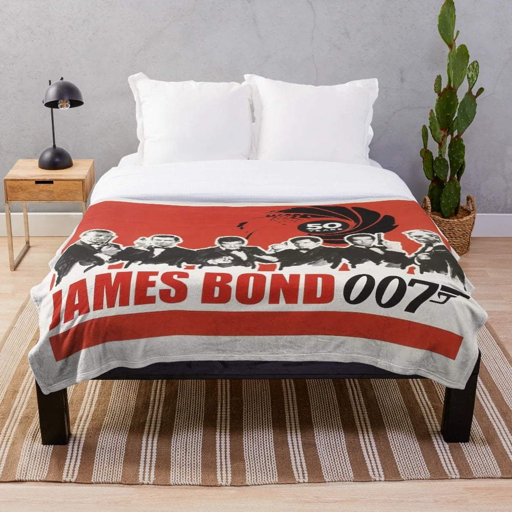 Vintage-inspired plush blanket featuring classic James Bond movie characters and imagery