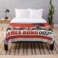 Vintage-inspired plush blanket featuring classic James Bond movie characters and imagery