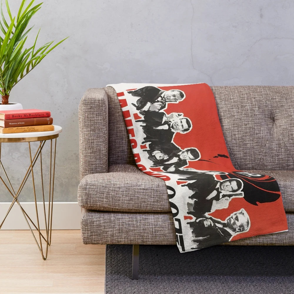 Vintage-inspired plush blanket featuring classic James Bond movie characters and imagery