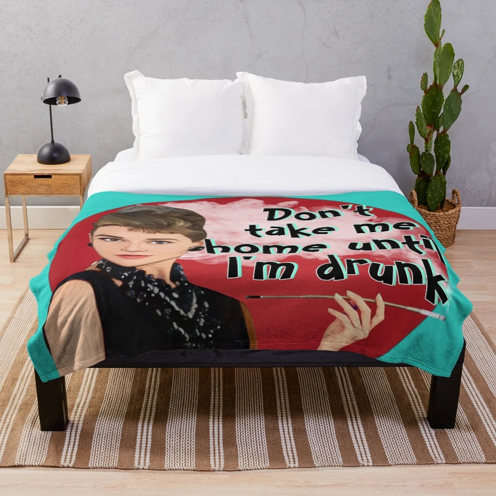 Plush blanket featuring an image of Audrey Hepburn from the classic film Breakfast at Tiffany's