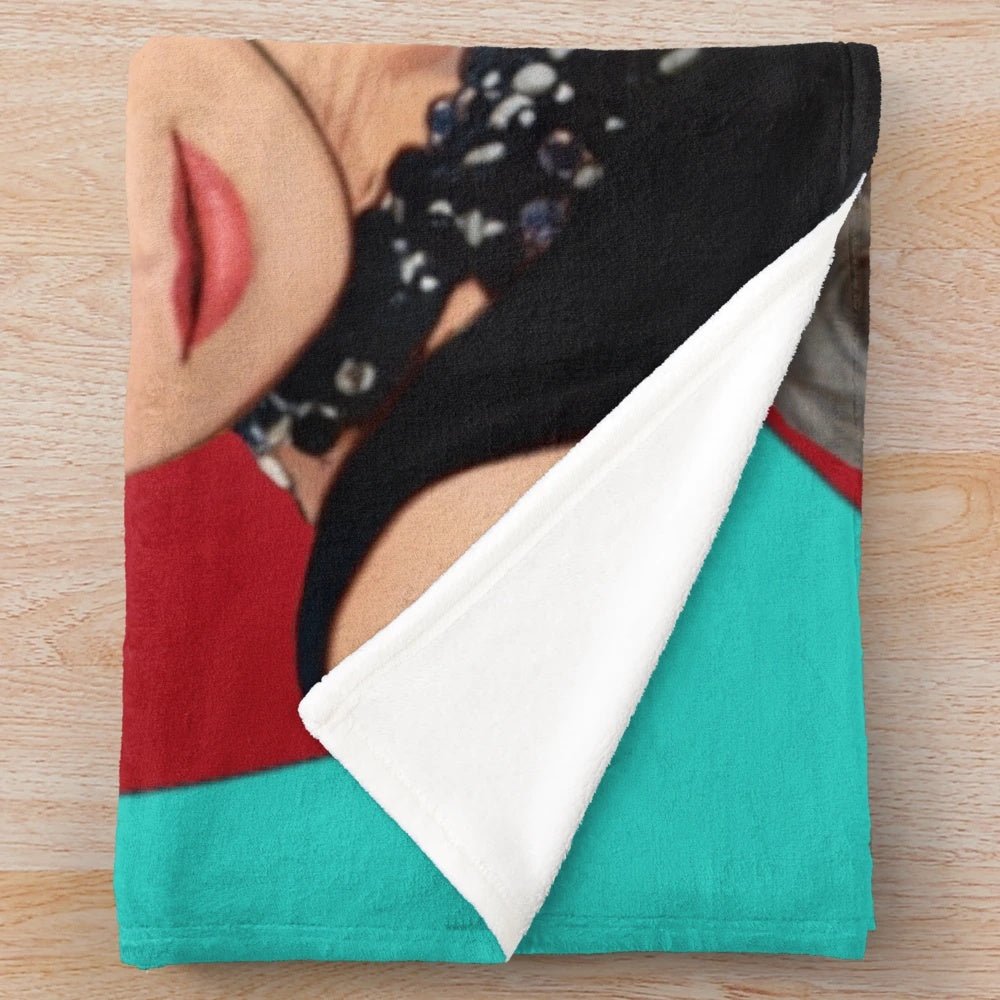 Plush blanket featuring an image of Audrey Hepburn from the classic film Breakfast at Tiffany's