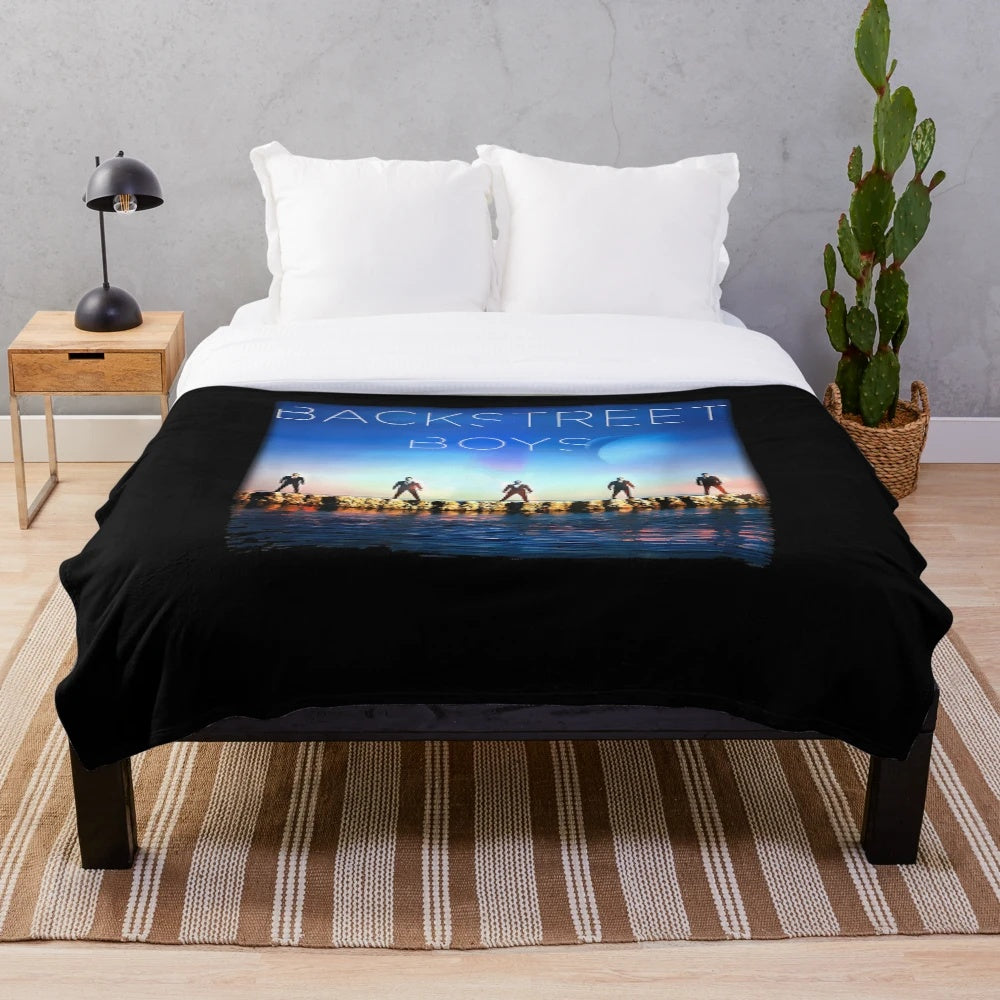 Vintage-inspired Backstreet Boys plush blanket featuring the band's iconic album art