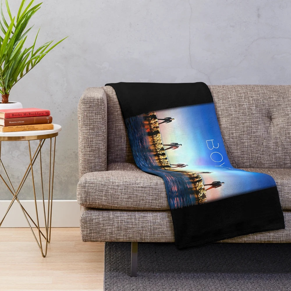 Vintage-inspired Backstreet Boys plush blanket featuring the band's iconic album art