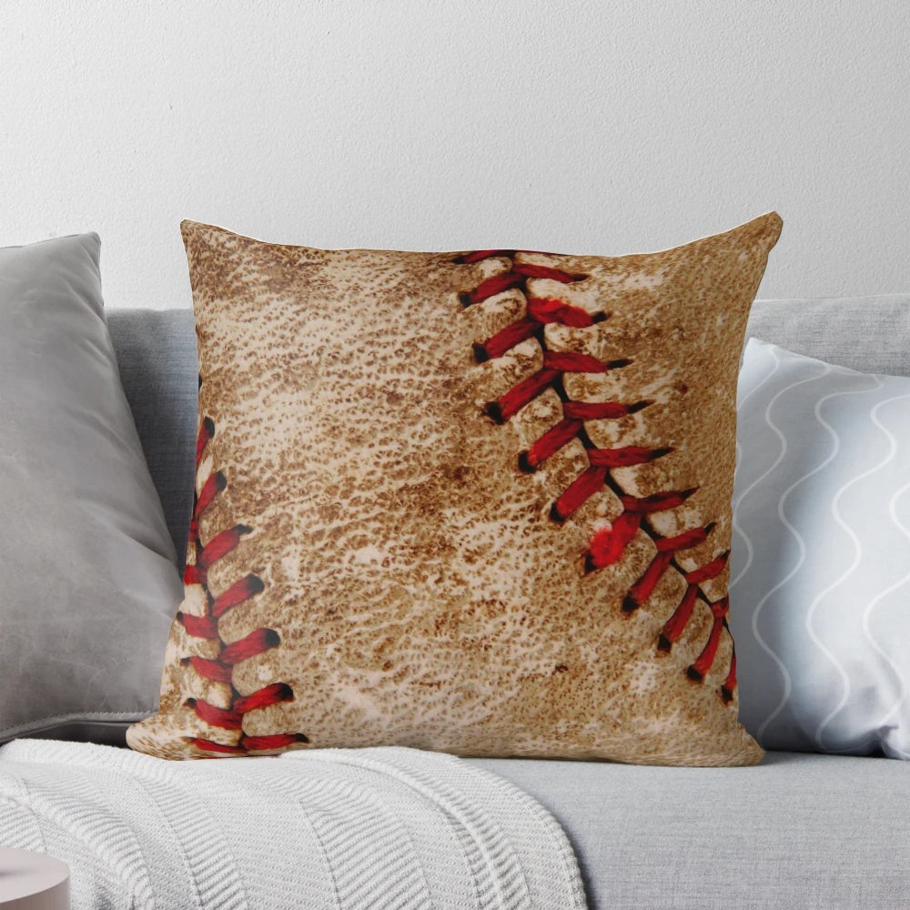 Vintage-style red and white baseball-themed throw pillow with stitching details