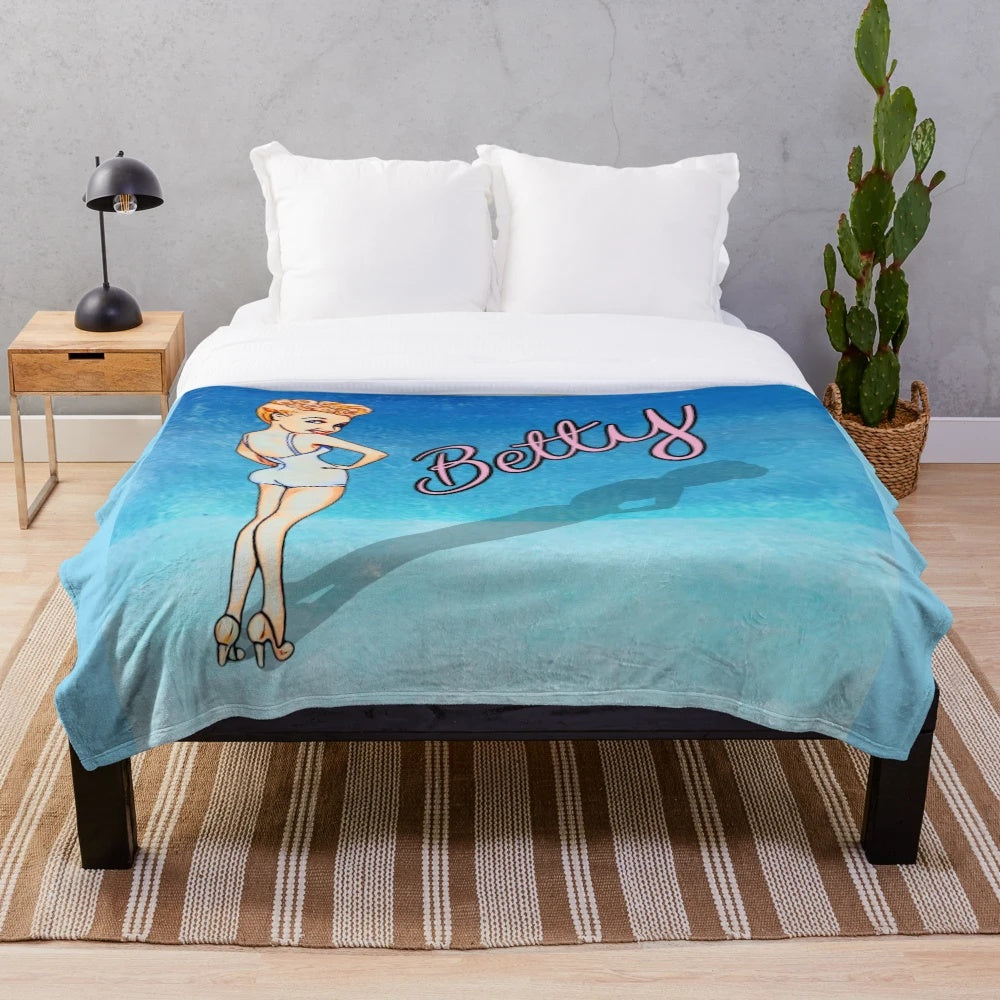 Soft, plush blanket featuring the iconic image of Hollywood star Betty Grable