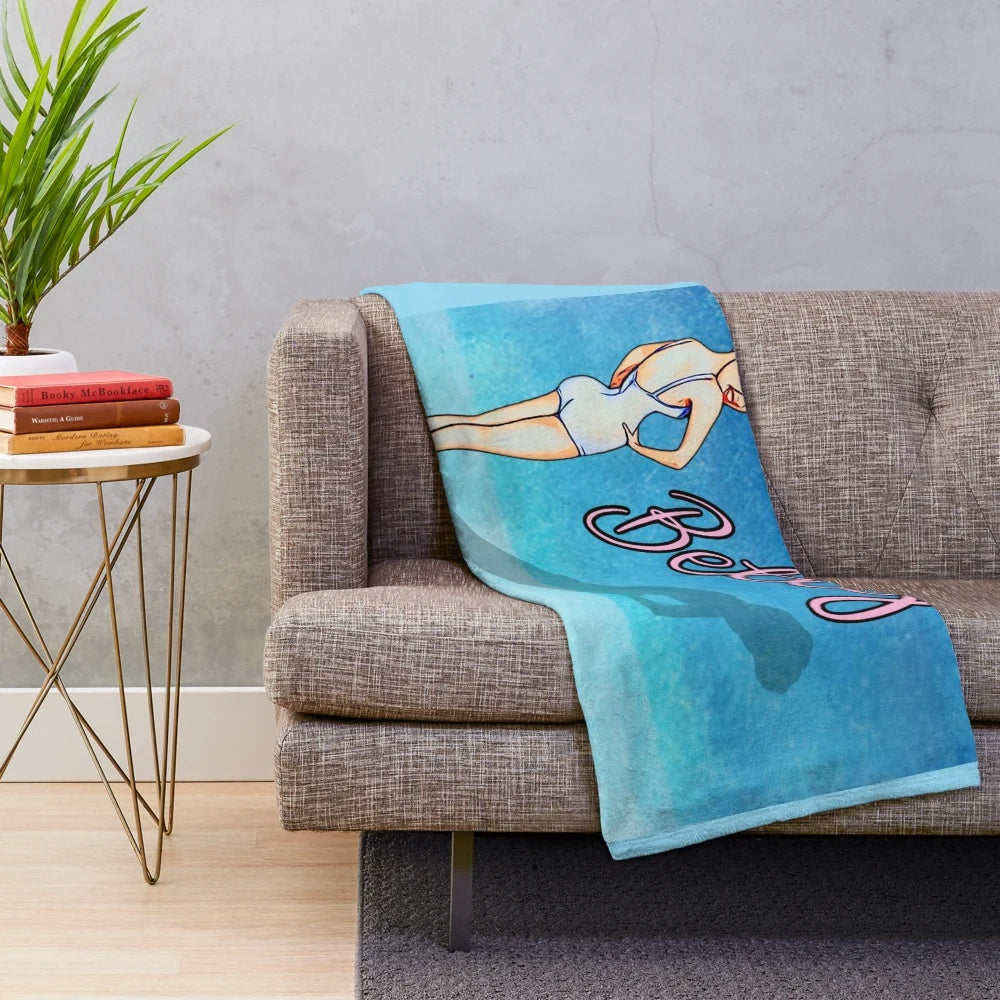 Soft, plush blanket featuring the iconic image of Hollywood star Betty Grable