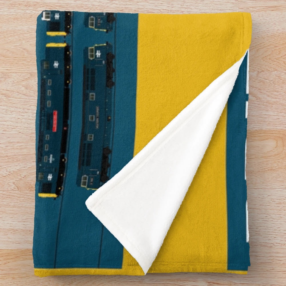 Cozy plush blanket featuring vintage British Rail train designs