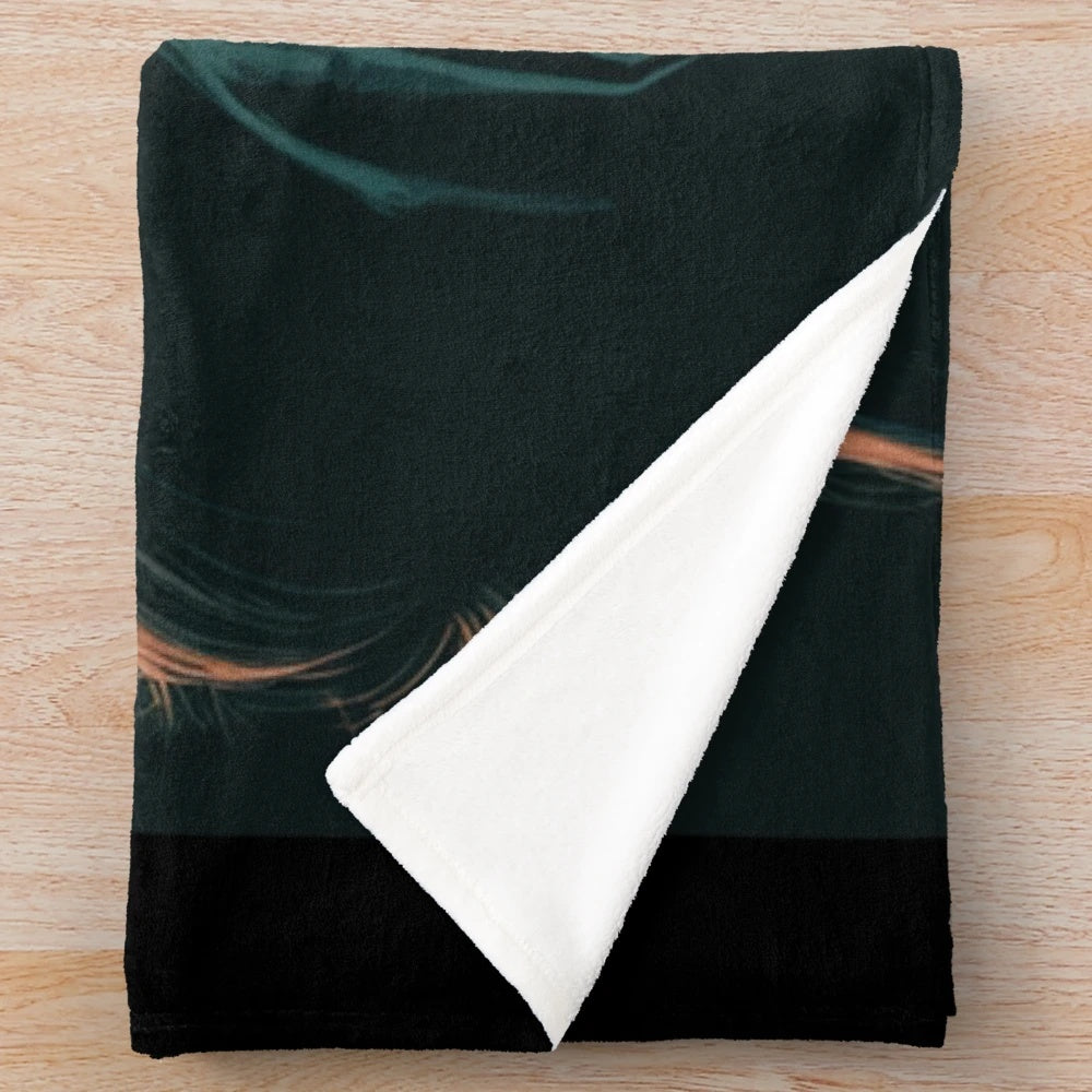 Vintage-inspired cinema plush blanket with movie reel and film noir design