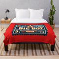 Plush vintage cinema ticket-inspired blanket with retro movie design