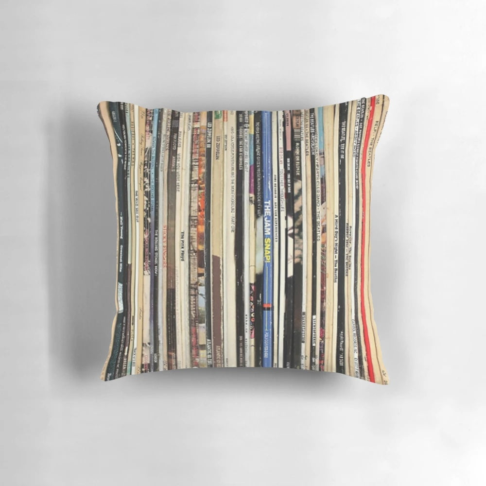Cozy classic rock-themed pillow featuring a collage of vintage vinyl records and album art
